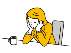 溜息をつく女性社員